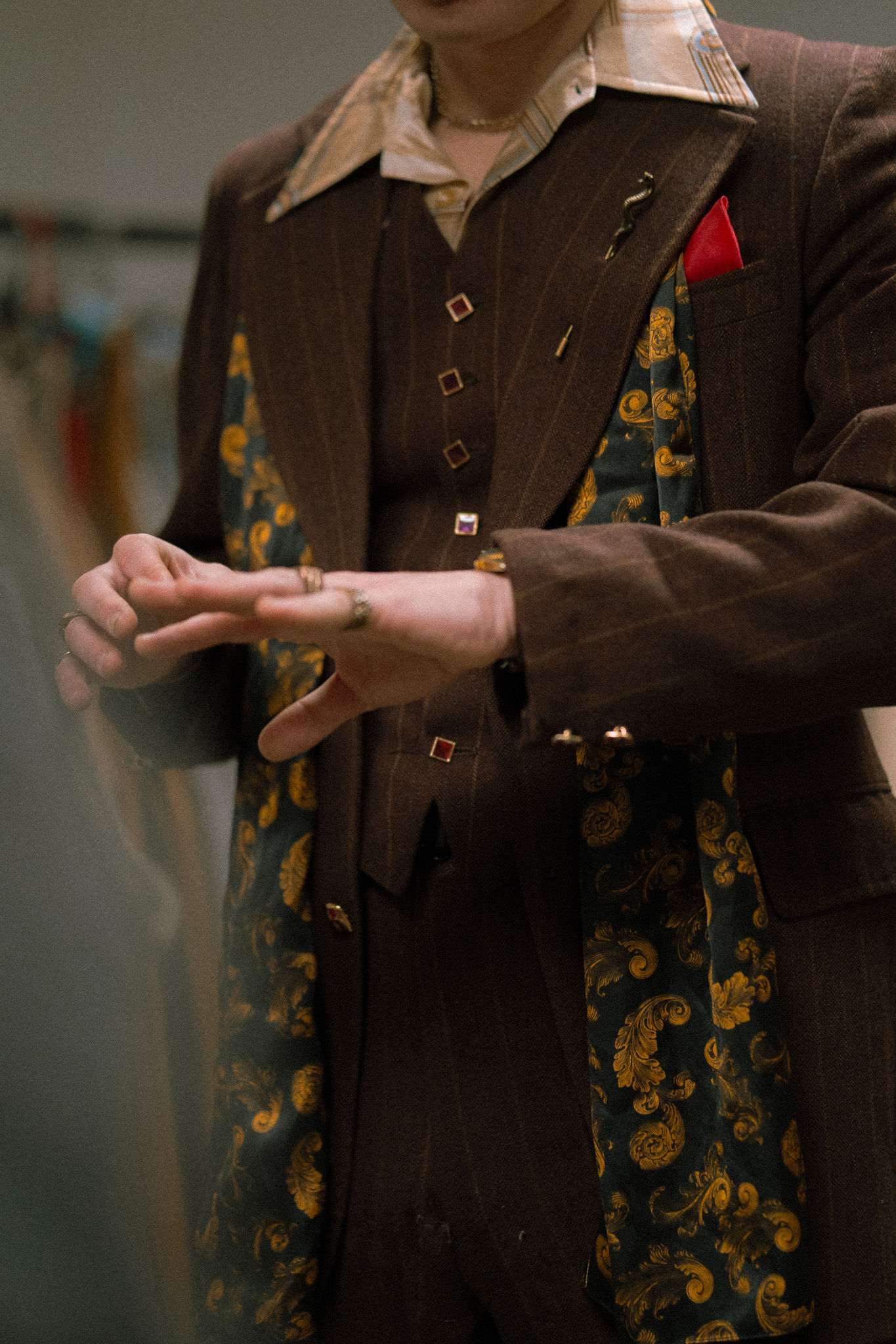 Pinstripe suit with paisley vest costume detail